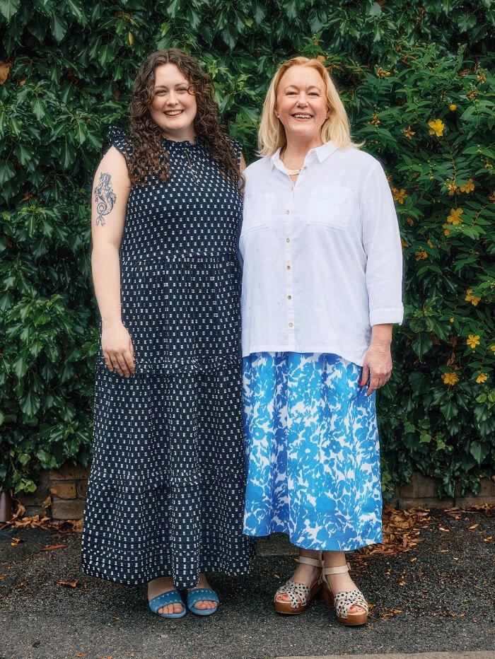 woman in dress and woman in shirt and skirt